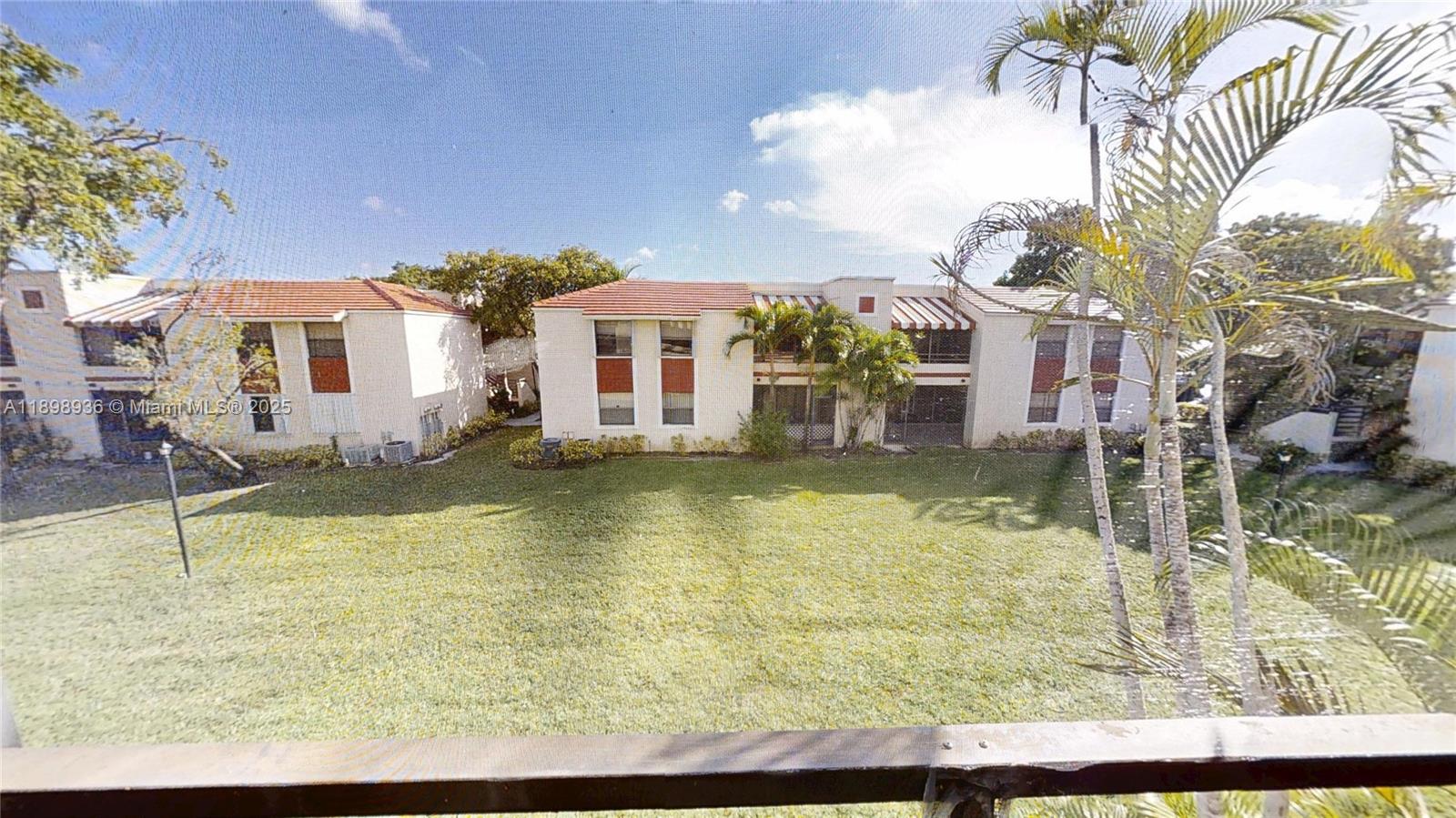 20230 Northeast 3rd Court, Unit 6 Miami, FL 33179 - Photo 42 of 44 a swimming pool view with a outdoor seating