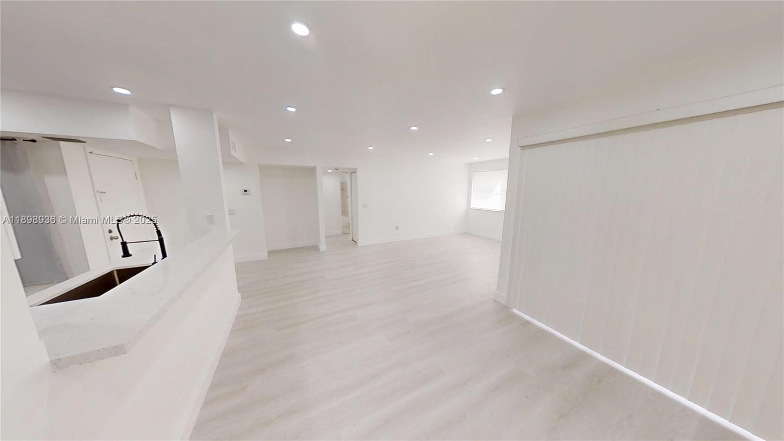 20230 Northeast 3rd Court, Unit 6 Miami, FL 33179 - Photo 5 of 44 a view of a large mirror