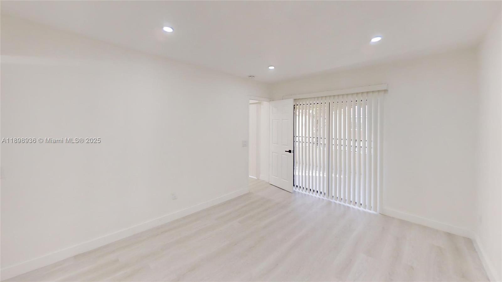 20230 Northeast 3rd Court, Unit 6 Miami, FL 33179 - Photo 10 of 44 a view of an empty room