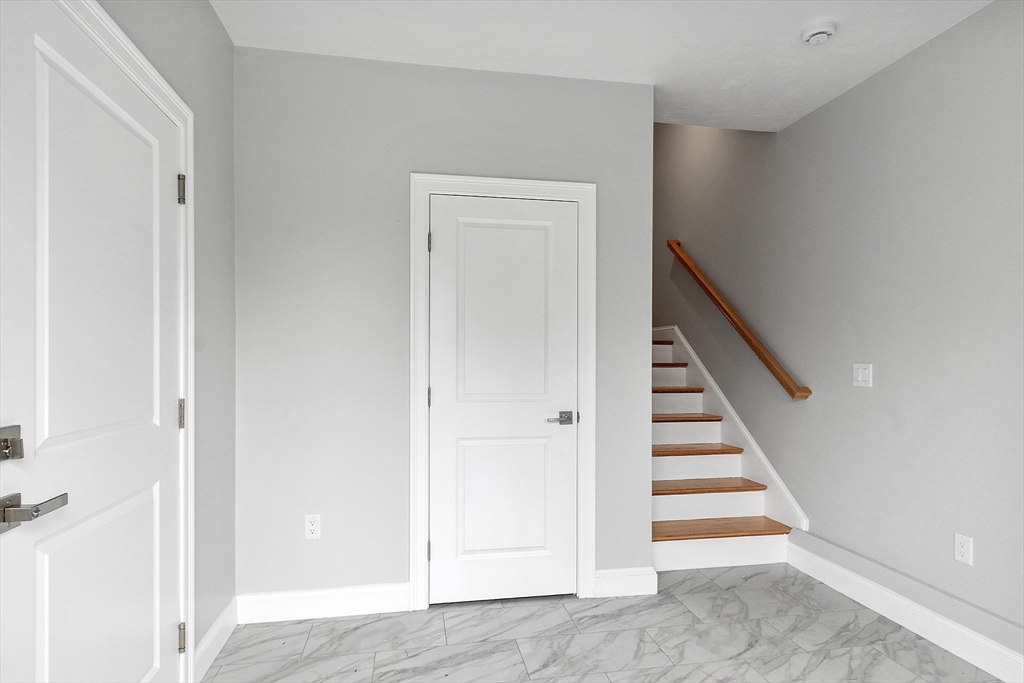 10 Windsor Street, Unit B Worcester, MA 01605 - Photo 13 of 38 a view of entryway with stairs