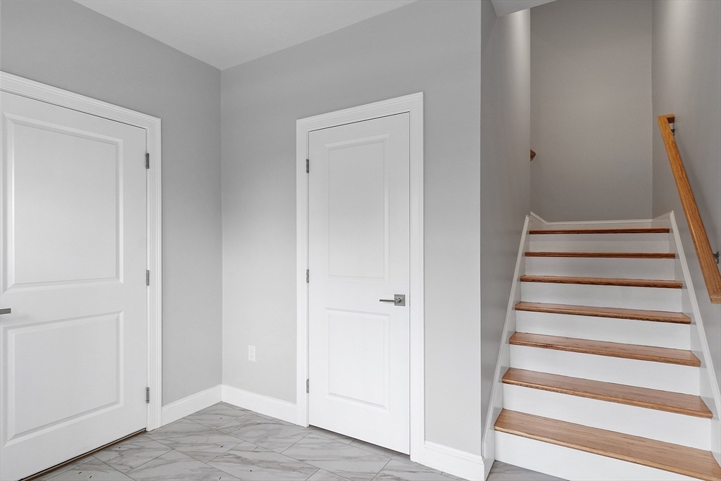 10 Windsor Street, Unit B Worcester, MA 01605 - Photo 33 of 38 a view of an entryway with wooden floor