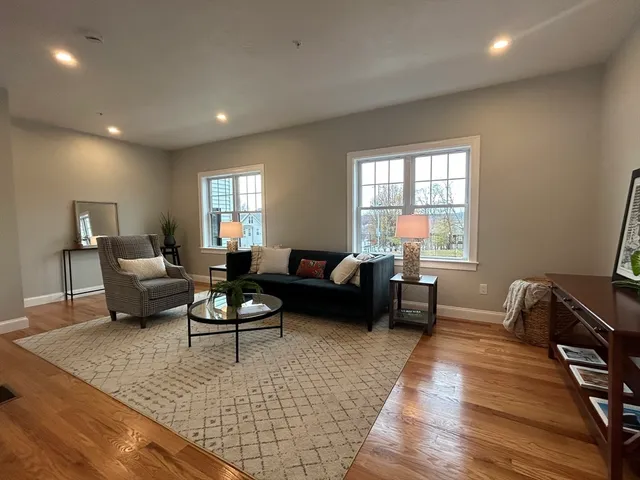 a living room with furniture and a couch