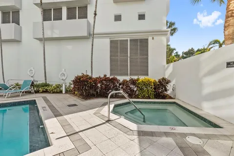 a view of a water fountain in front of building