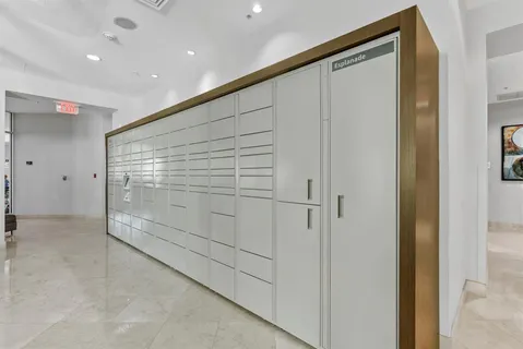 a view of a hallway with dining area
