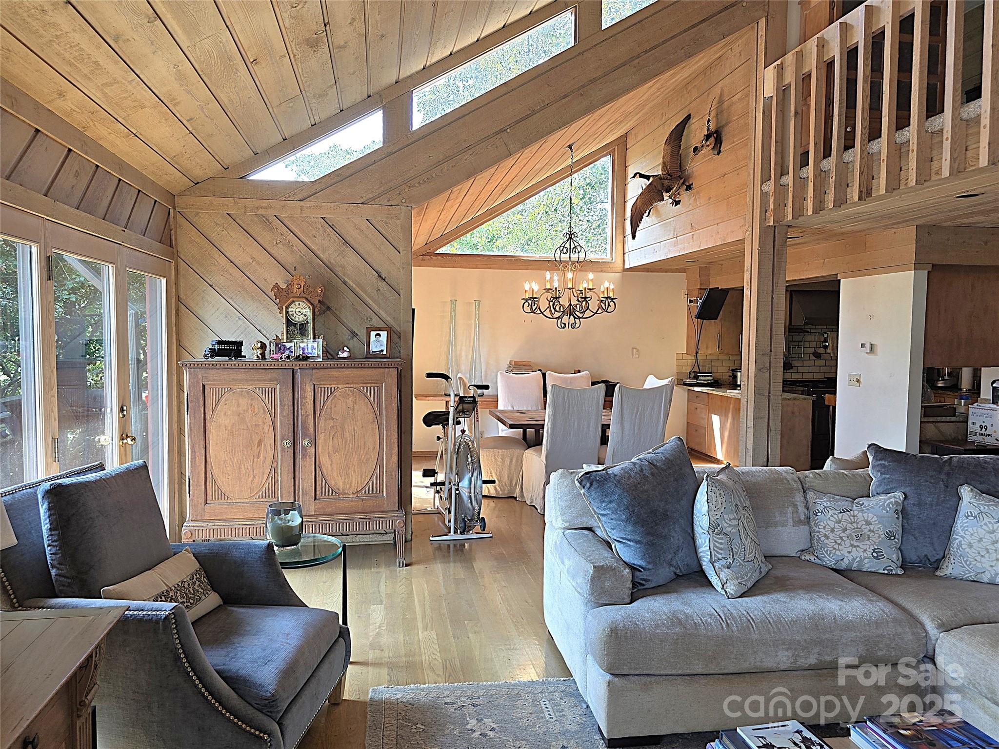 6580 Central Drive Conover, NC 28613 - Photo 13 of 27 a living room with furniture and a chandelier