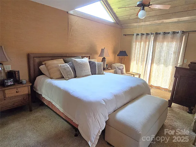 a view of a livingroom with shelves