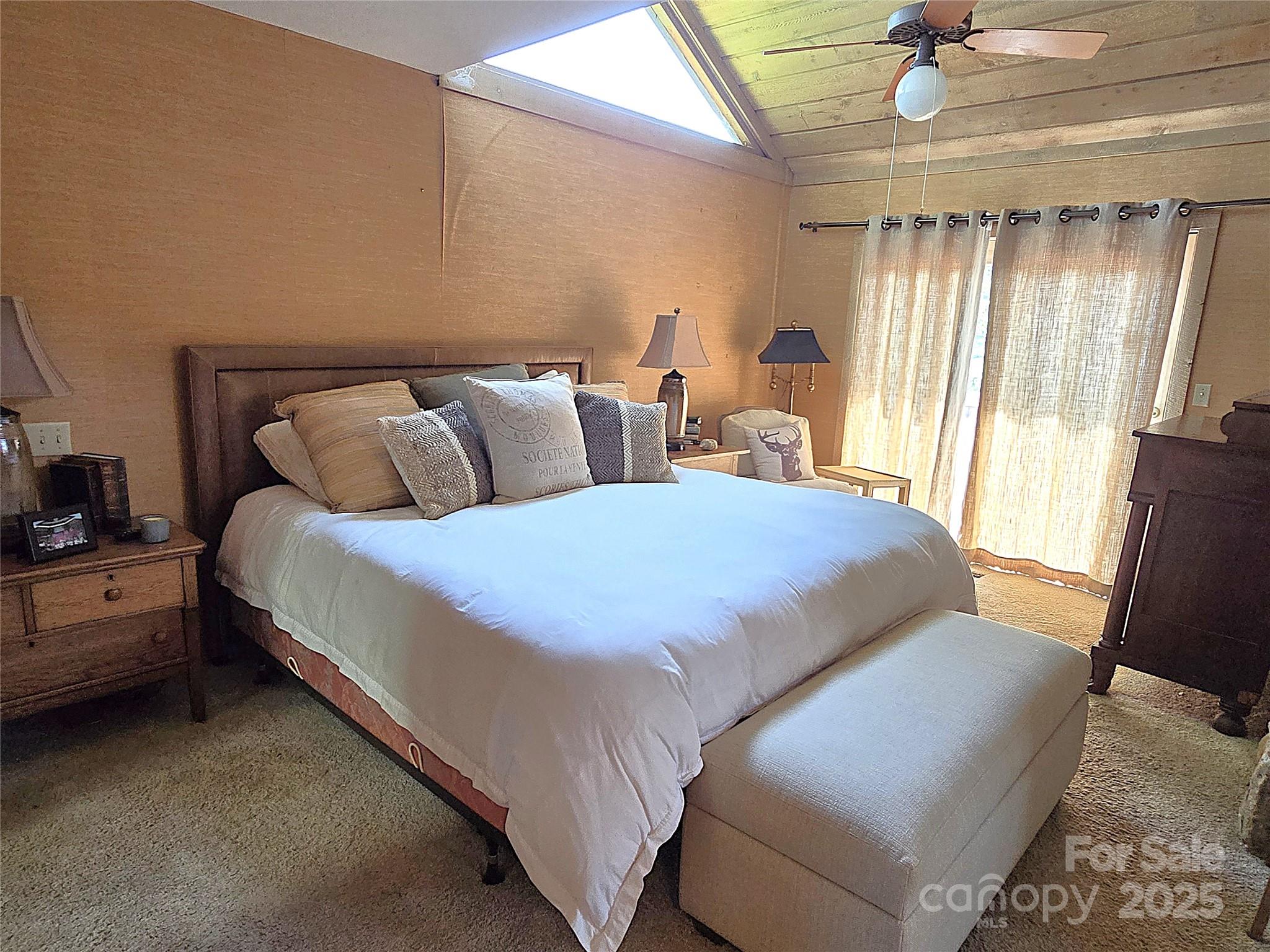 6580 Central Drive Conover, NC 28613 - Photo 15 of 27 a large bed sitting in a bedroom next to a window