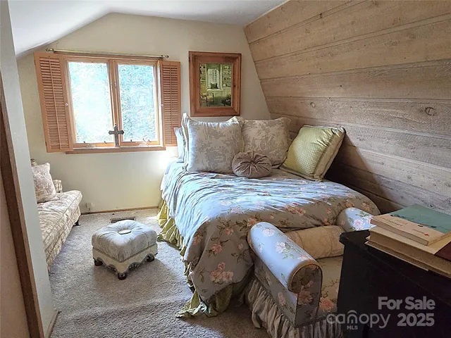 a bathroom with a toilet and bathtub