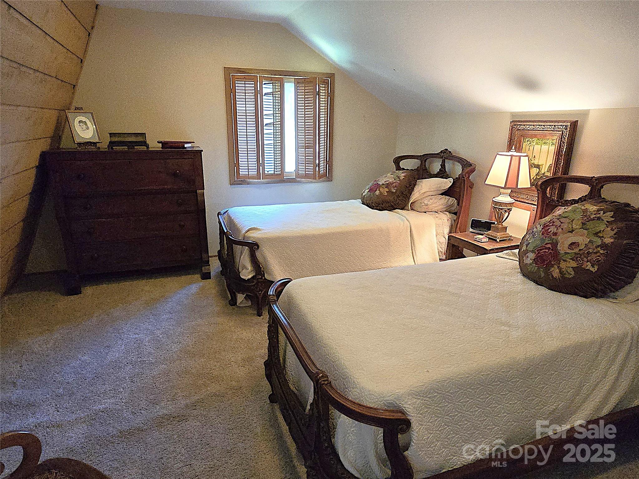 6580 Central Drive Conover, NC 28613 - Photo 21 of 27 a bed sitting in a bedroom next to a window