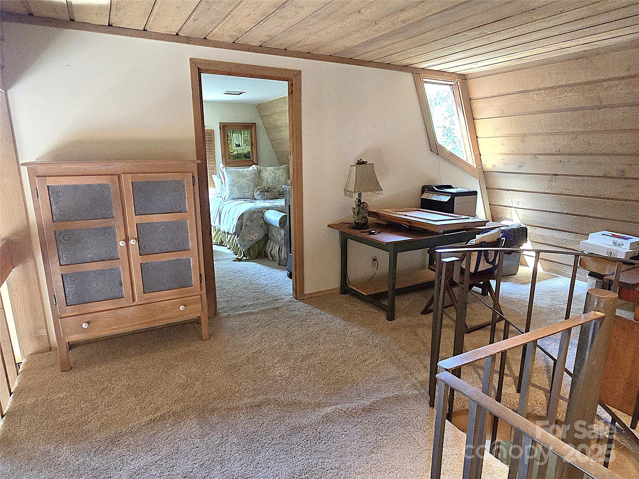 6580 Central Drive Conover, NC 28613 - Photo 22 of 27 a view of workspace with wooden floor and windows