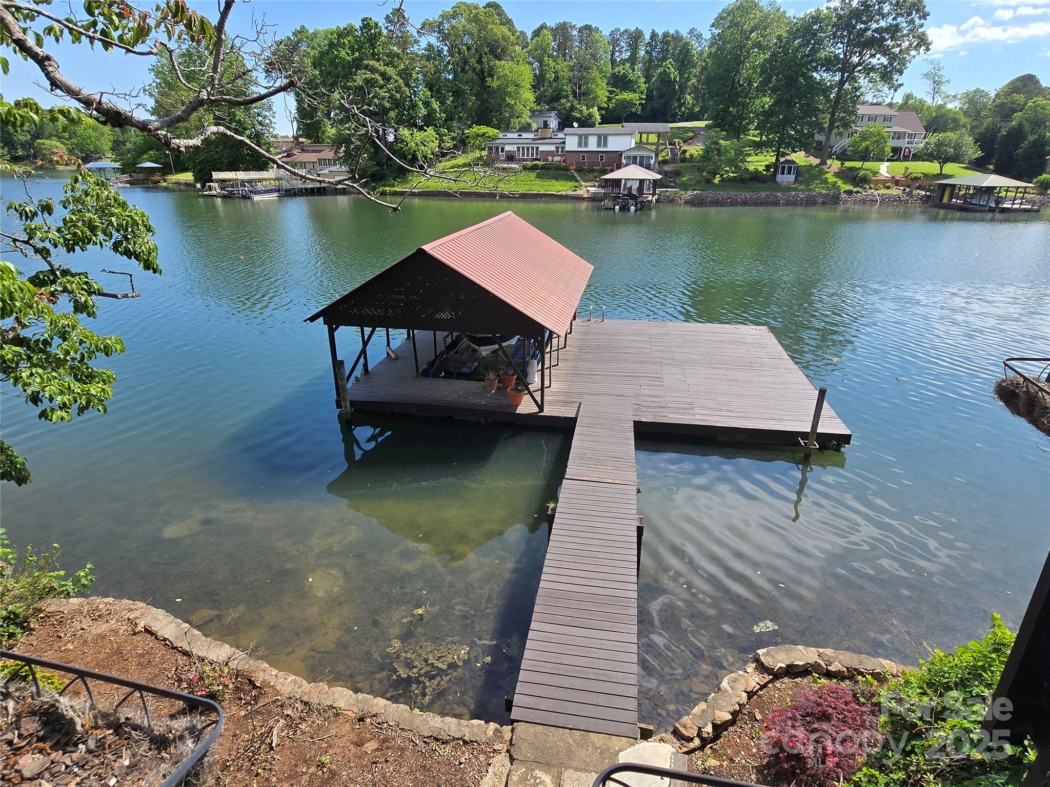 6580 Central Drive Conover, NC 28613 - Photo 3 of 27 a view of a lake with sitting area