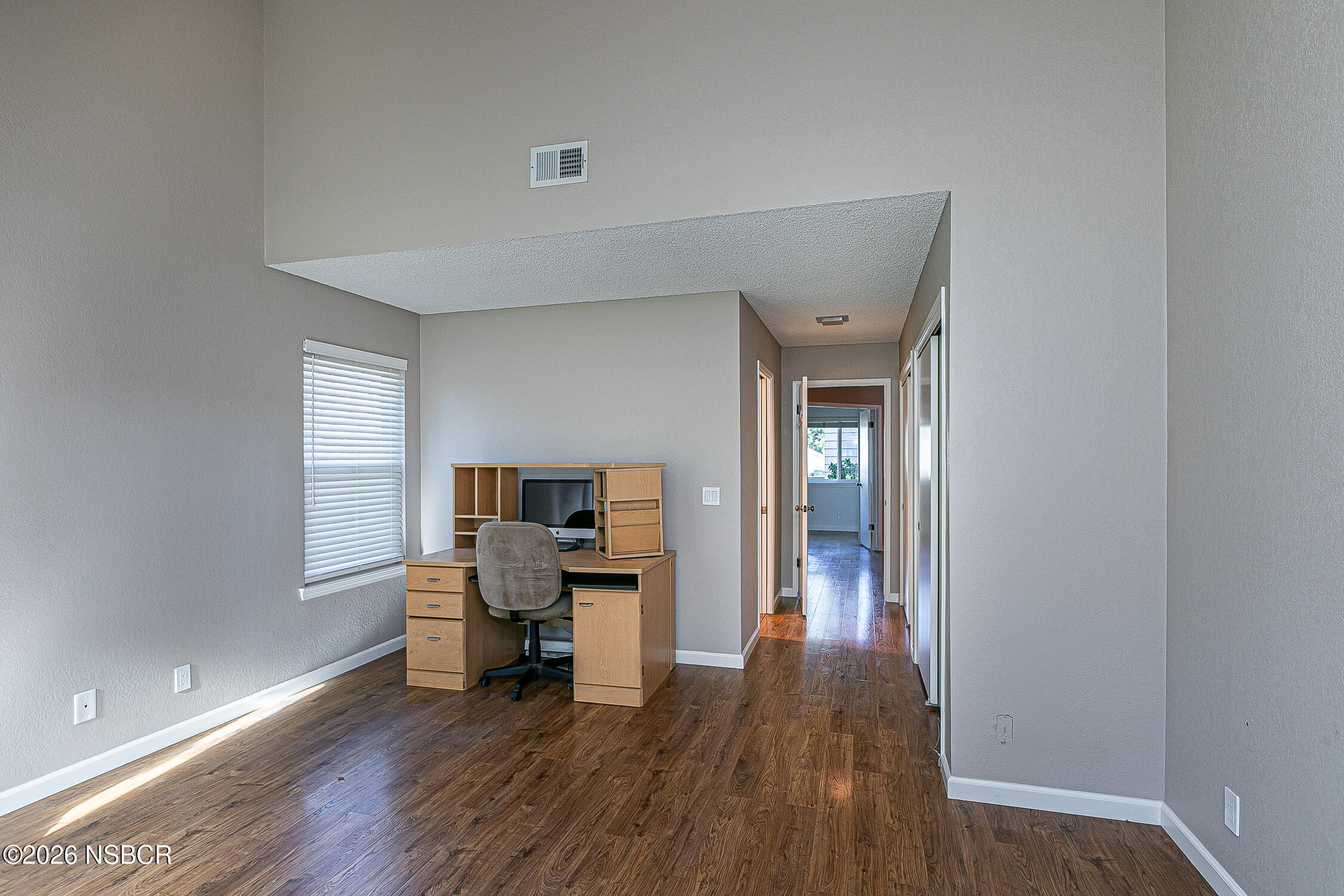 1412 Oakridge Park Road Santa Maria, CA 93455 - Photo 13 of 35 a view of a livingroom with lounge chair a ceiling fan and windows