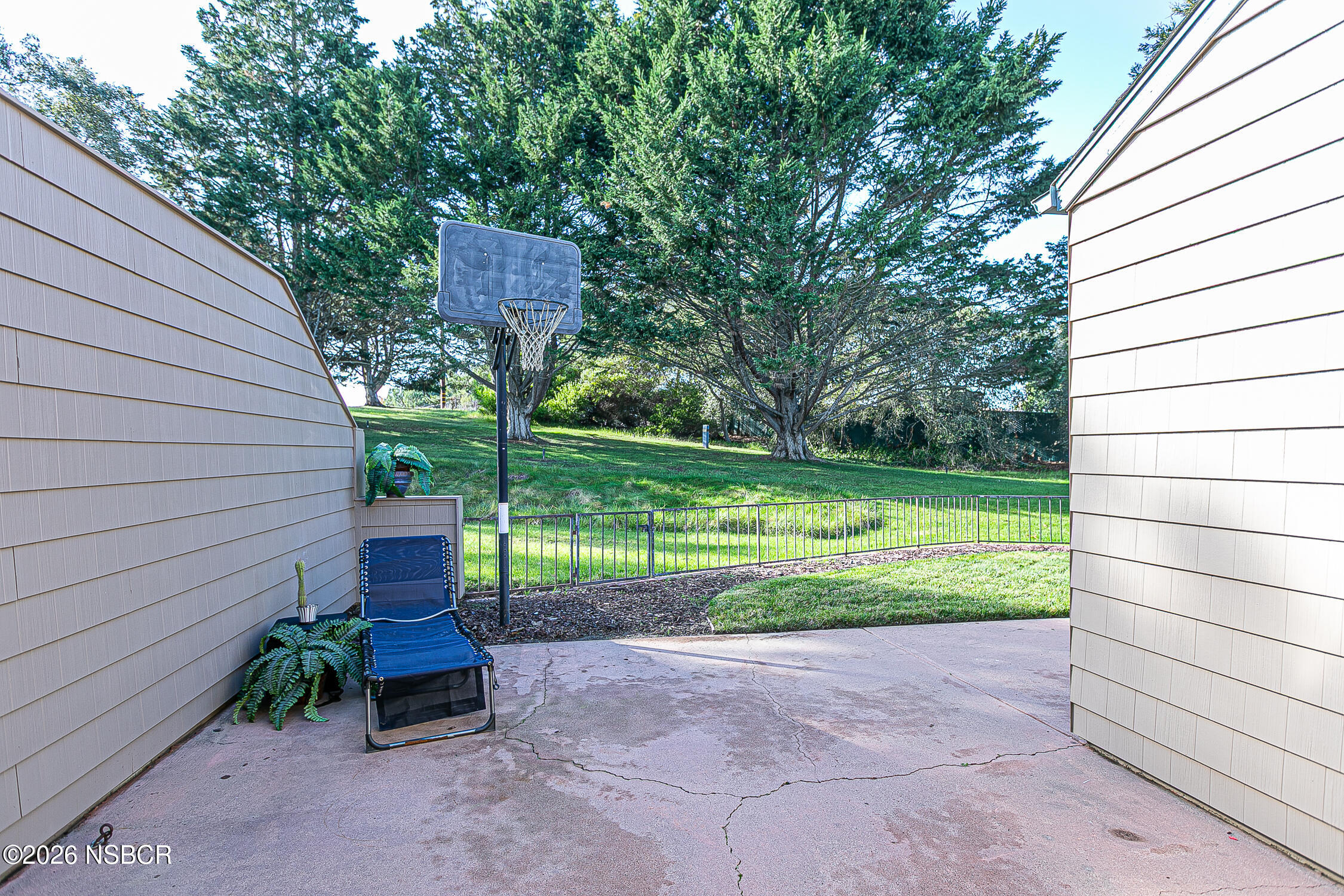 1412 Oakridge Park Road Santa Maria, CA 93455 - Photo 18 of 35 a view of a chair and table in the garden