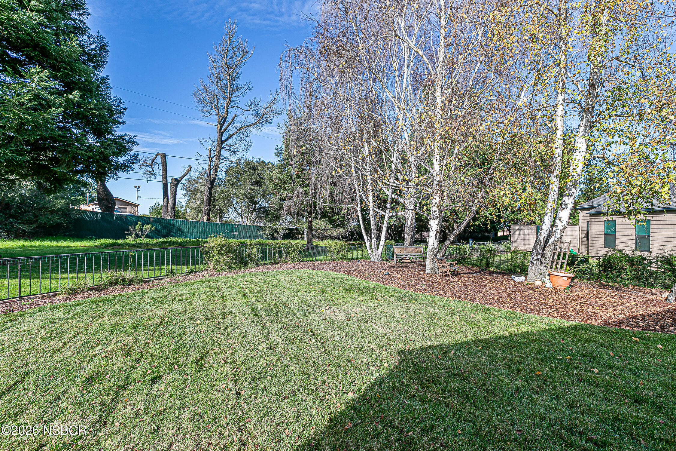 1412 Oakridge Park Road Santa Maria, CA 93455 - Photo 21 of 35 a view of a house with a yard and a tree