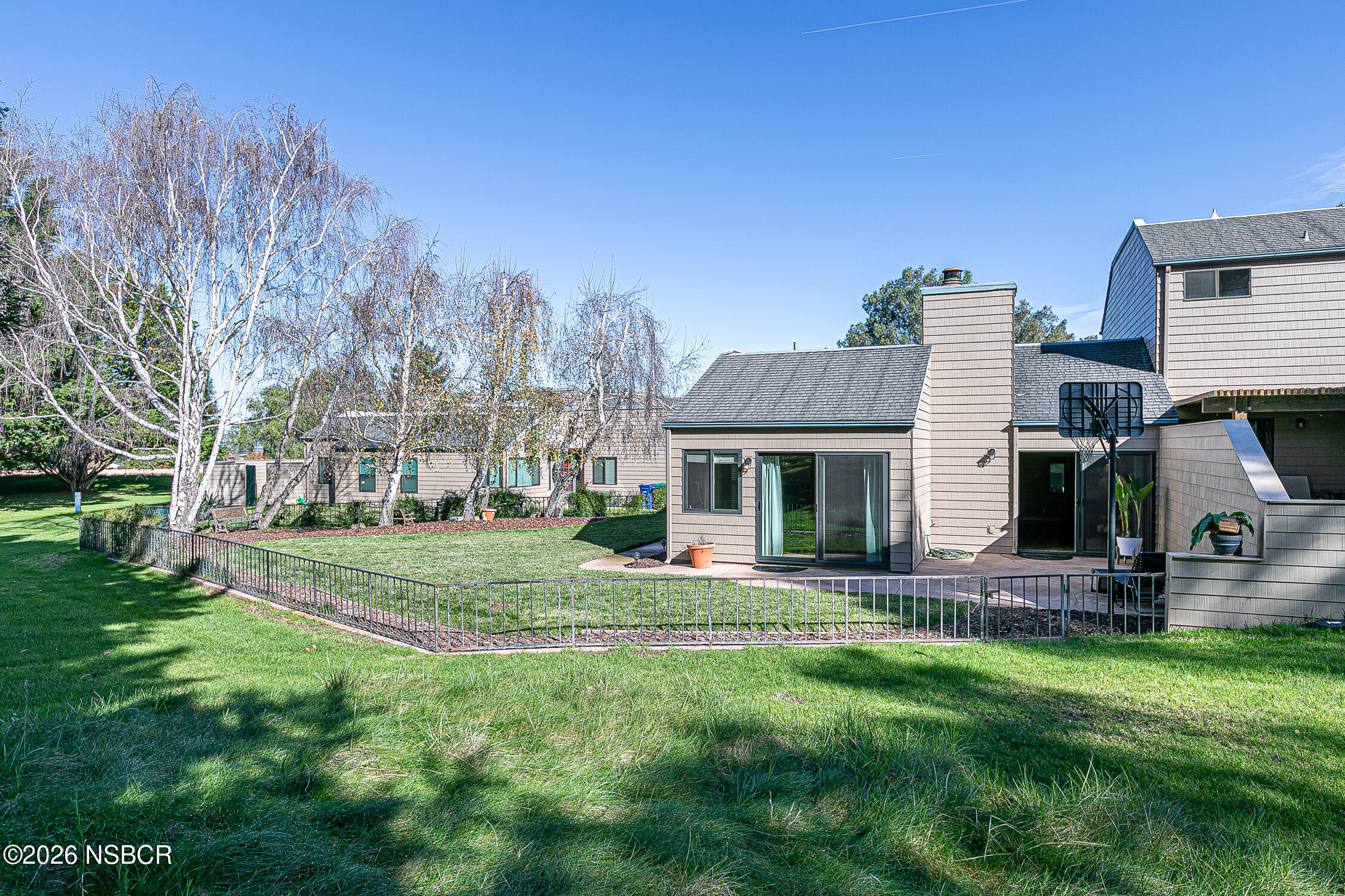 1412 Oakridge Park Road Santa Maria, CA 93455 - Photo 24 of 35 a front view of house with outdoor seating and yard
