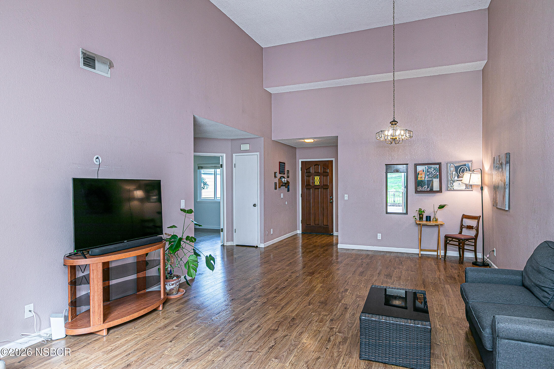 1412 Oakridge Park Road Santa Maria, CA 93455 - Photo 6 of 35 a living room with furniture and a flat screen tv