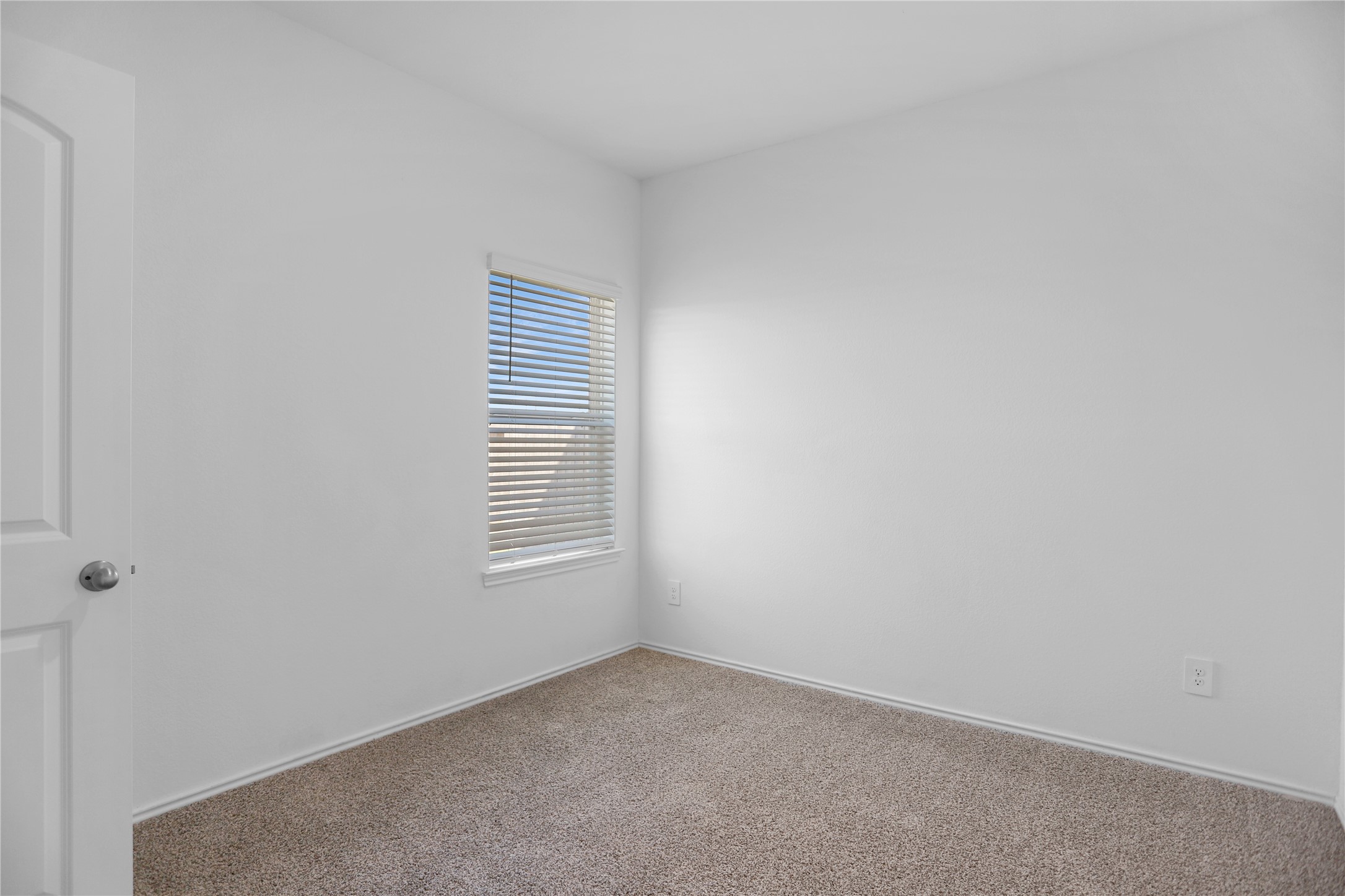 24311 Saddlestone Green Dr Spring Spring, TX 77373 - Photo 14 of 36 a view of an empty room with a window