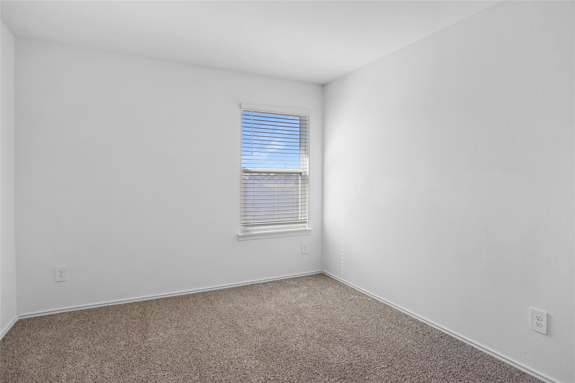 24311 Saddlestone Green Dr Spring Spring, TX 77373 - Photo 24 of 36 an empty room with a window