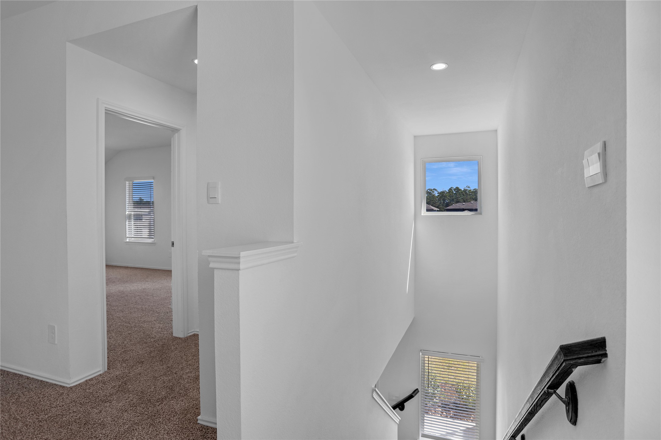 24311 Saddlestone Green Dr Spring Spring, TX 77373 - Photo 32 of 36 a view of a hallway with a elevator