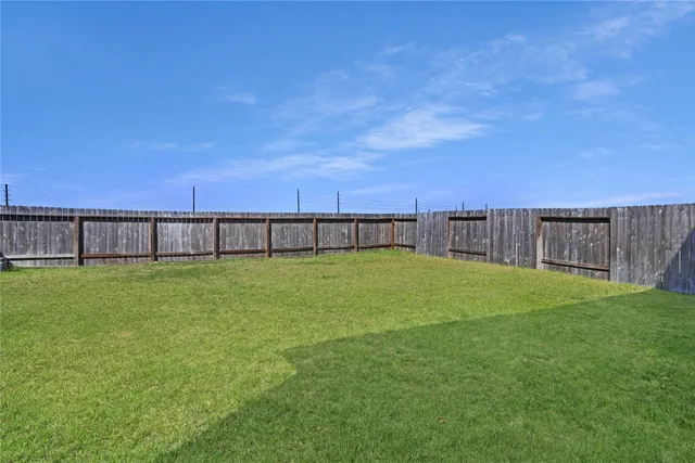 a view of a backyard with a garden