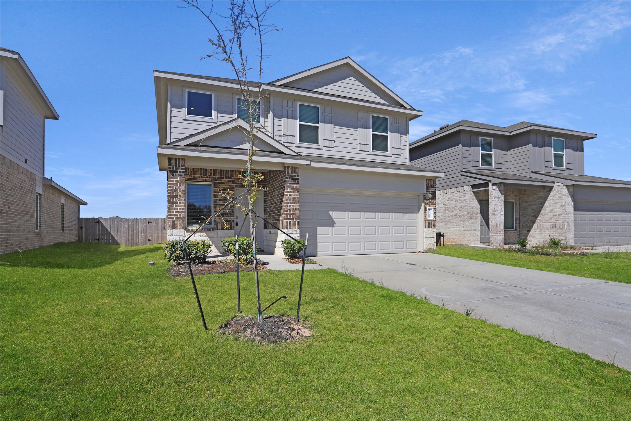 24311 Saddlestone Green Dr Spring Spring, TX 77373 - Photo 36 of 36 a front view of a house with a yard