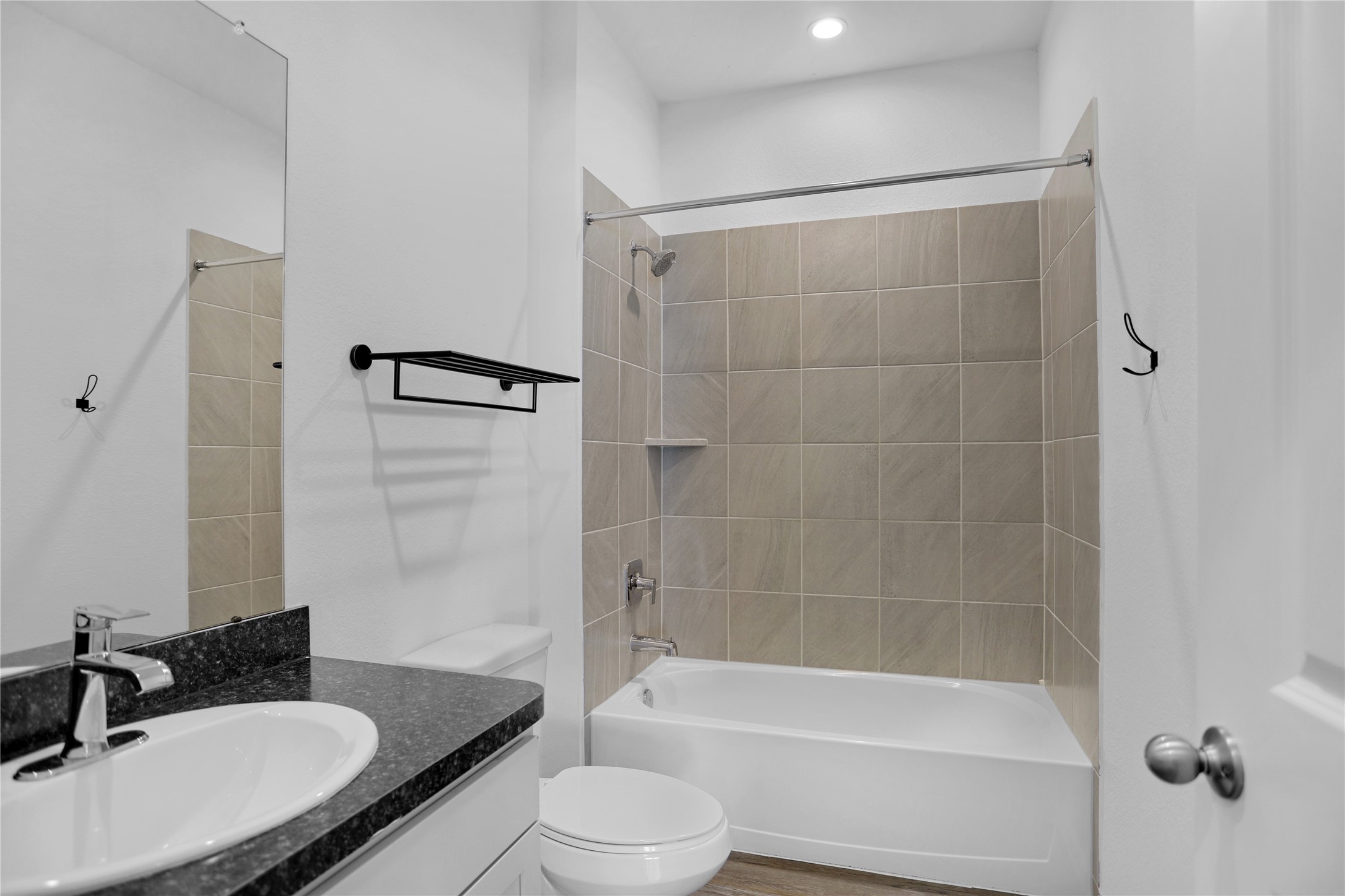24311 Saddlestone Green Dr Spring Spring, TX 77373 - Photo 9 of 36 a bathroom with a granite countertop sink toilet and shower