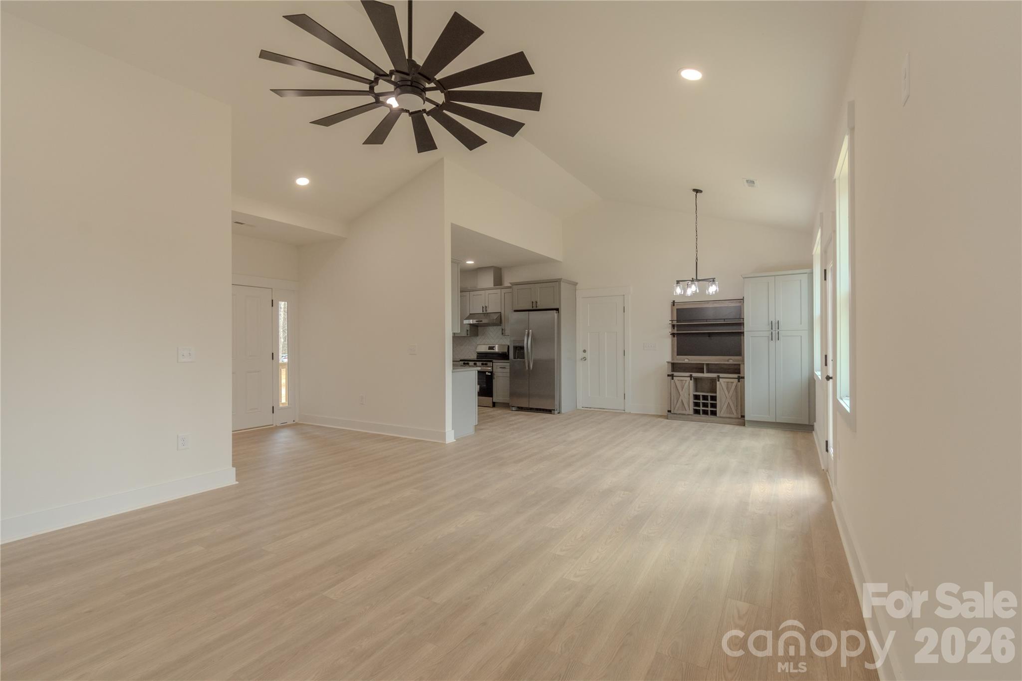 10303 Sycamore Road, Unit 90 Norwood, NC 28128 - Photo 17 of 42 a view of an empty room with a window