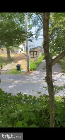 a view of backyard with green space