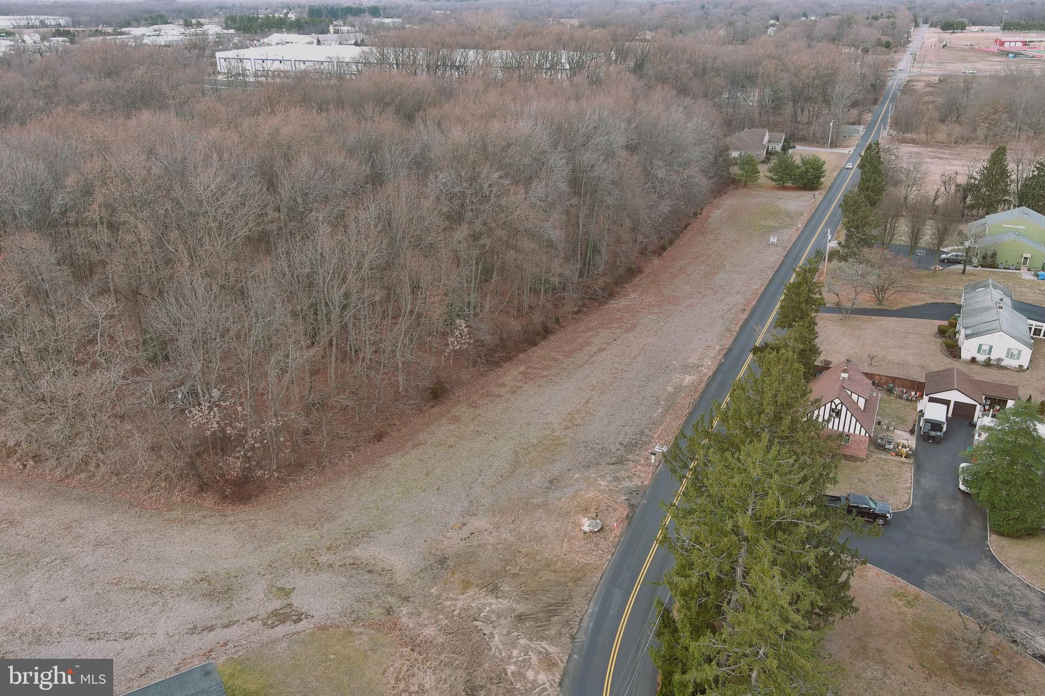 26 Garwin Road Swedesboro, NJ 08085 - Photo 2 of 10 a view of a yard with trees
