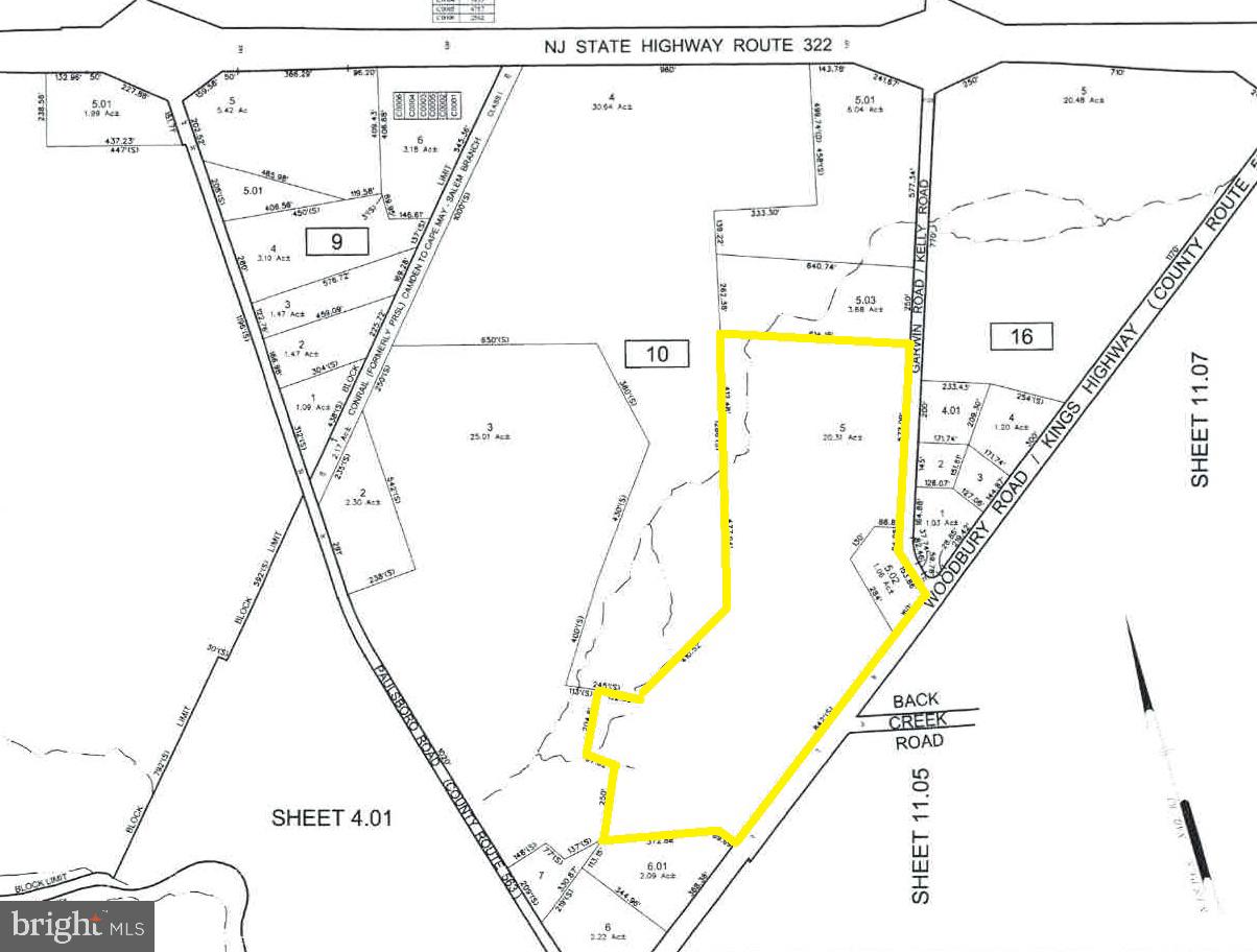 10-26 Garwin Road Swedesboro, NJ 08085 - Photo 10 of 10 a picture of a room with a white bed and a chair