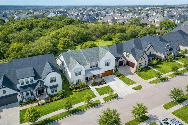 an aerial view of a house with a garden