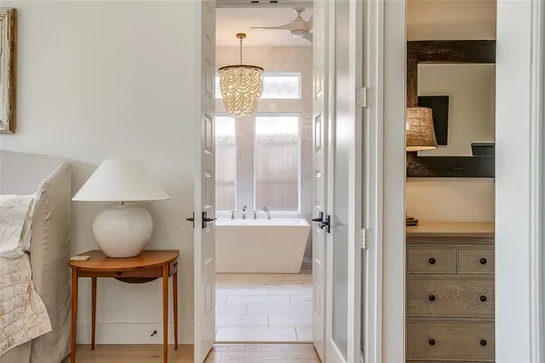 a bathroom with a mirror and a sink