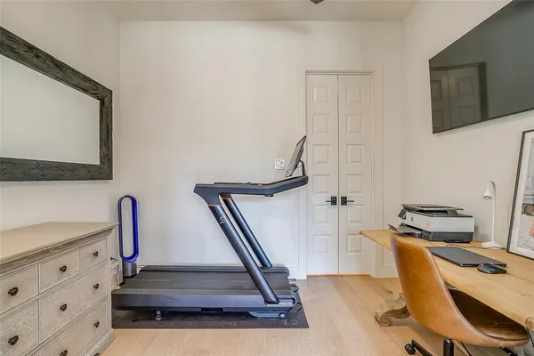 a view of a room with gym equipment