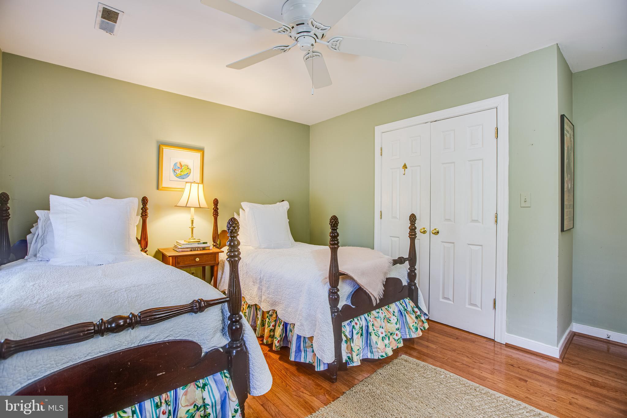 20 Aiken Road Fredericksburg, VA 22405 - Photo 21 of 33 a bedroom with a bed and wooden floor
