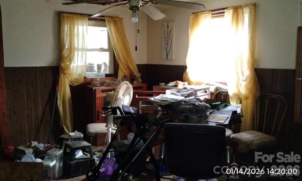 337 Red Bank Road Waynesville, NC 28786 - Photo 3 of 9 a view of a workspace with furniture and a window