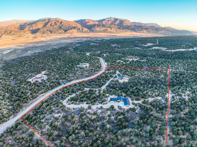 6688 Bareback Road Cedar City, UT 84720 - Photo 39 of 58 Aerial view of property and surrounding area with property parcel outlined and mountains