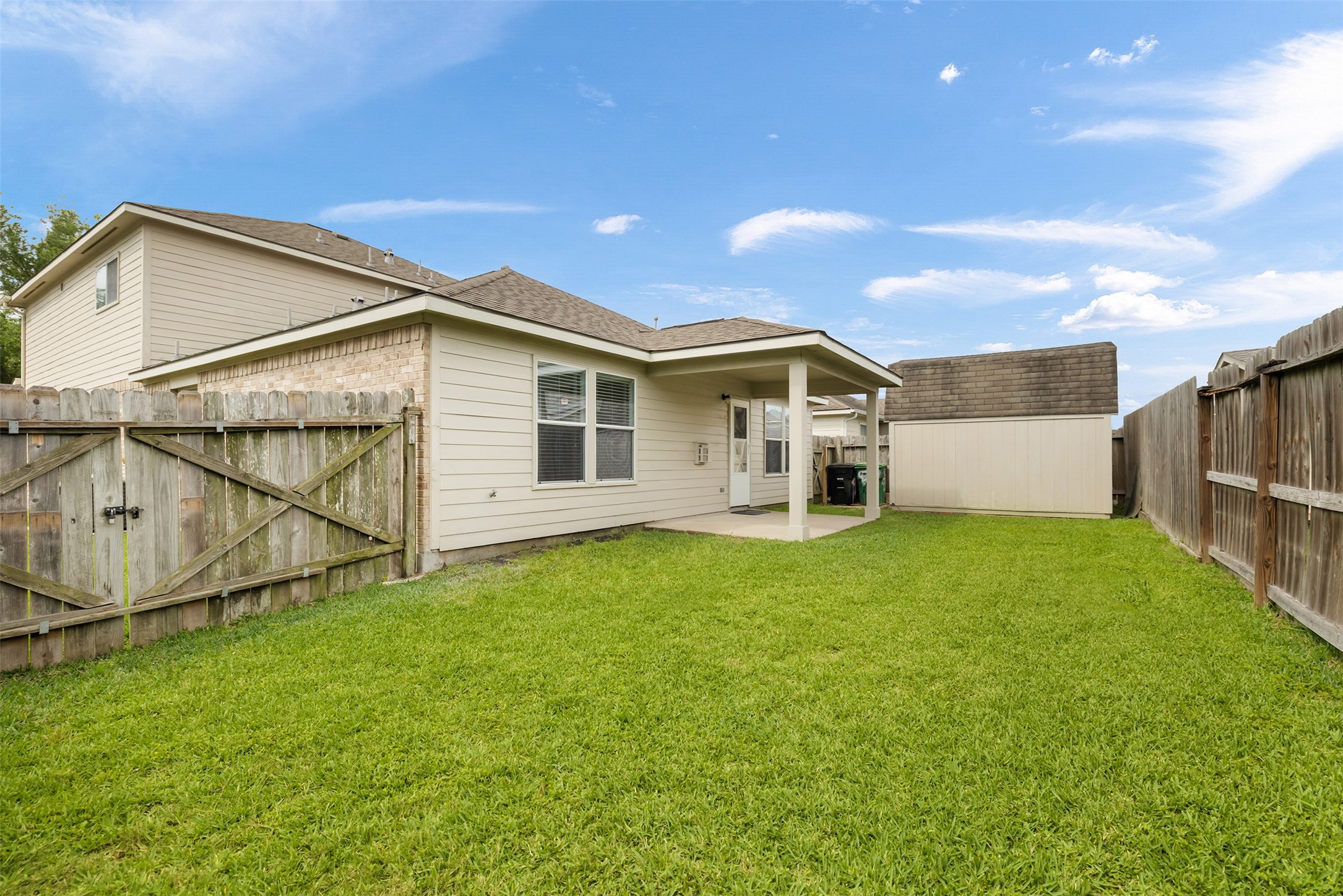 9339 Canady Park Lane Houston, TX 77075 - Photo 40 of 44 Backyard with custom made shed to match home.