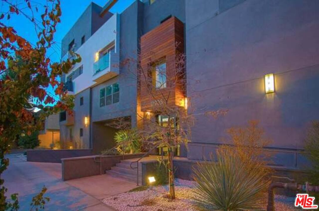 11925 Kling Street, Unit 311 Valley Village, CA 91607 - Photo 1 of 25 a building view with a outdoor space