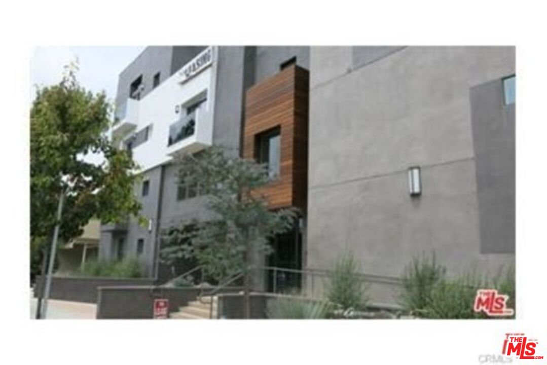 11925 Kling Street, Unit 311 Valley Village, CA 91607 - Photo 13 of 25 a black and white photo of a building