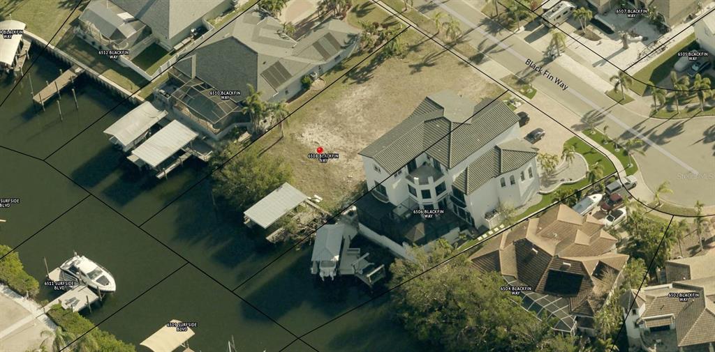 6508 Black Fin Way Apollo Beach, FL 33572 - Photo 16 of 19 an aerial view of a house with a yard and outdoor seating