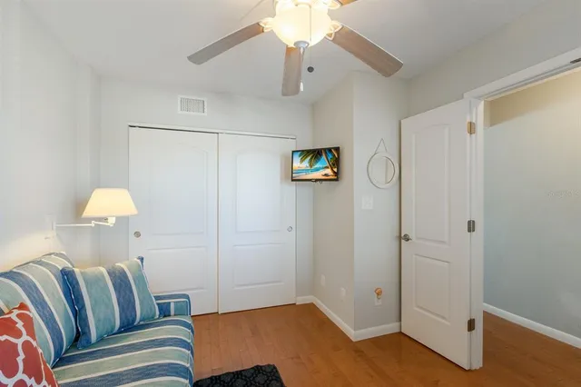 a view of a livingroom with furniture and staircase