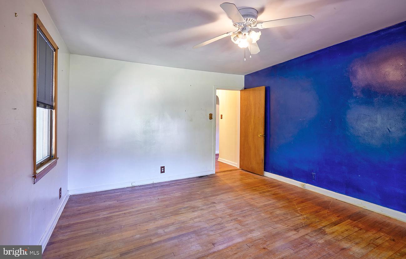 9 Chesterfield Georgetown Road Chesterfield, NJ 08515 - Photo 29 of 47 a view of an empty room with window and a ceiling fan