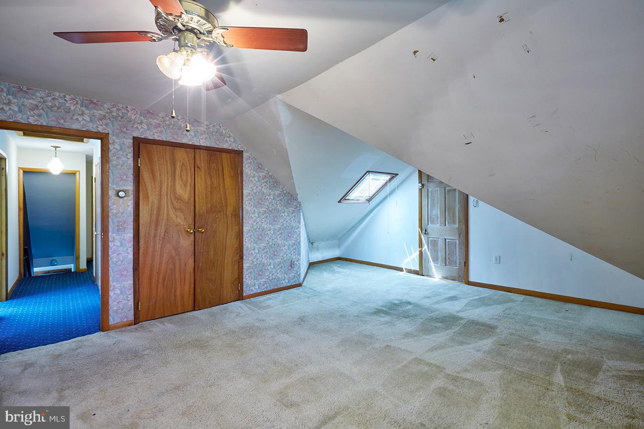 9 Chesterfield Georgetown Road Chesterfield, NJ 08515 - Photo 36 of 47 a view of an empty room with a chandelier fan