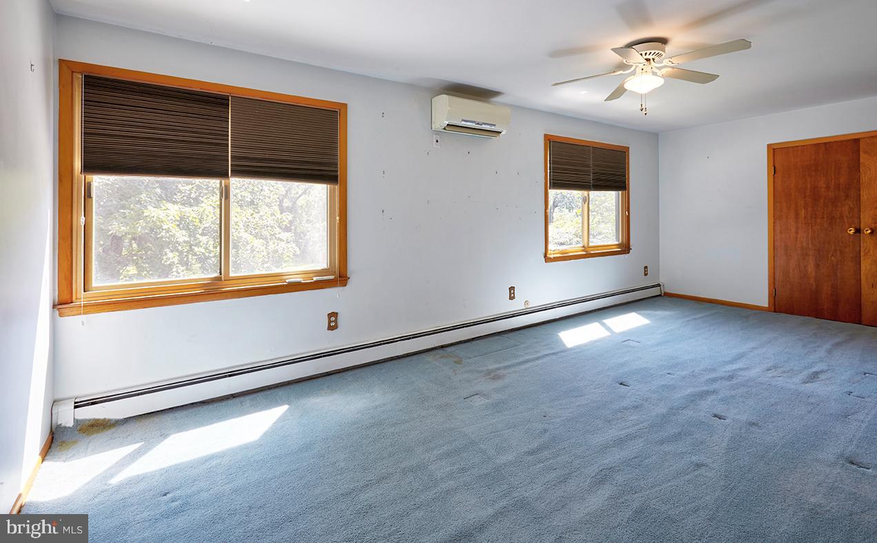 9 Chesterfield Georgetown Road Chesterfield, NJ 08515 - Photo 42 of 47 wooden floor in an empty room with a window