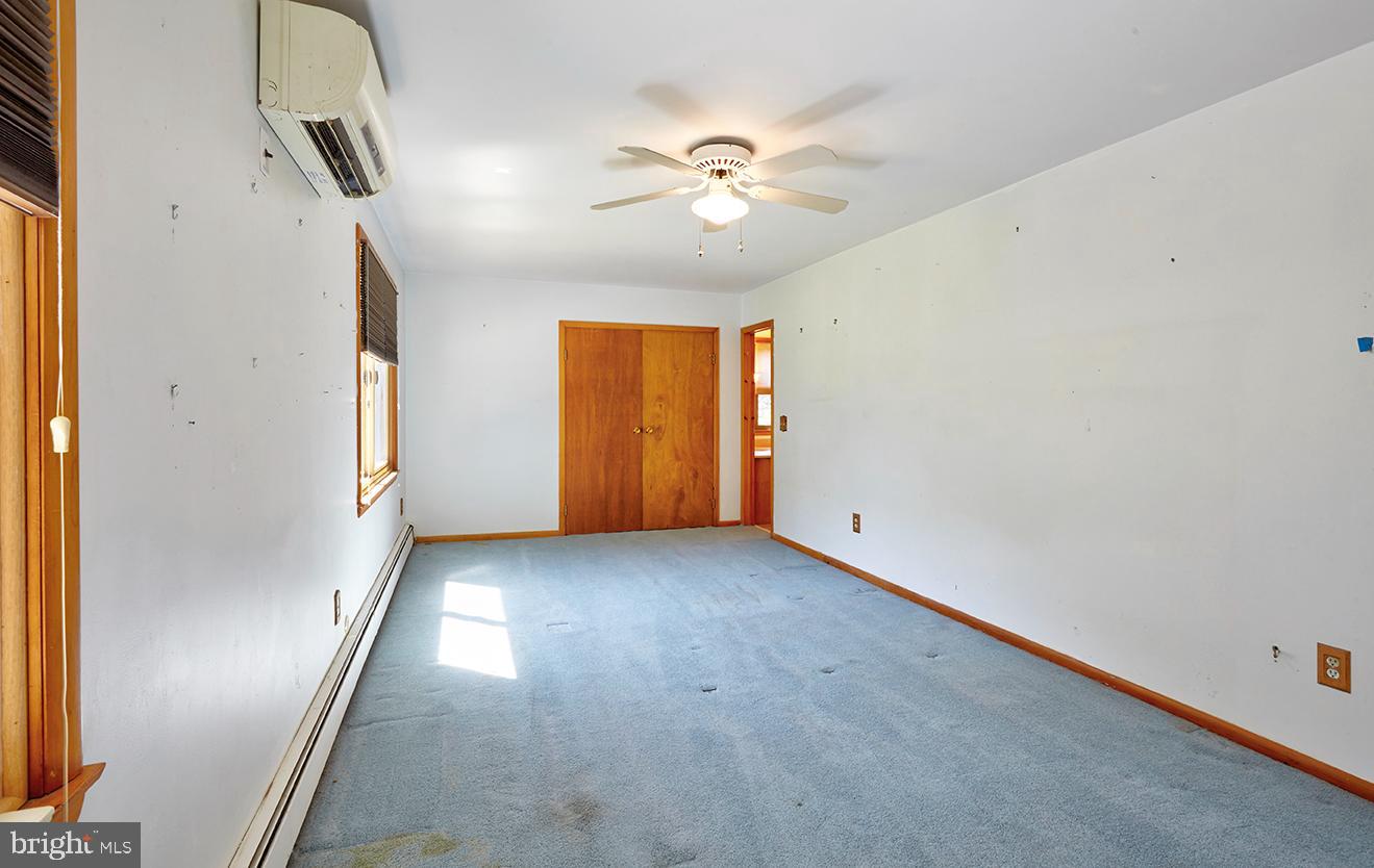 9 Chesterfield Georgetown Road Chesterfield, NJ 08515 - Photo 44 of 47 a view of an empty room with window and chandelier fan