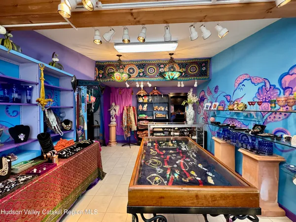 a store room with lots of fruit and vegetables