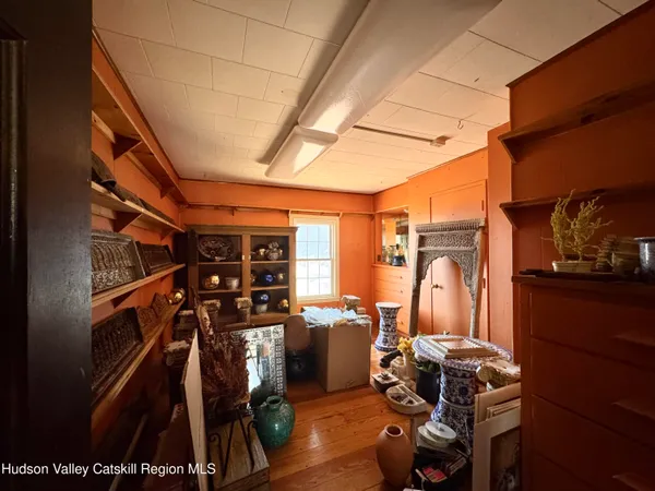a kitchen with granite countertop a sink and cabinets