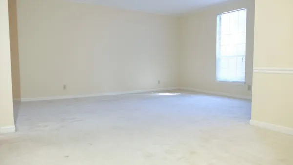 an empty room with a window