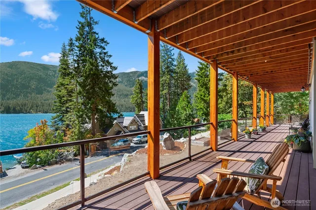 a view of a balcony with wooden floor