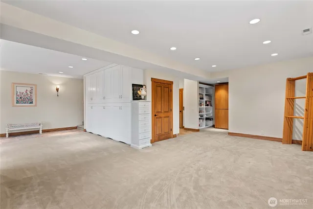 a bathroom with a toilet sink and shower